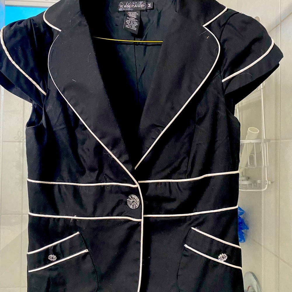 Black with White trim jacket. Short sleeved.
